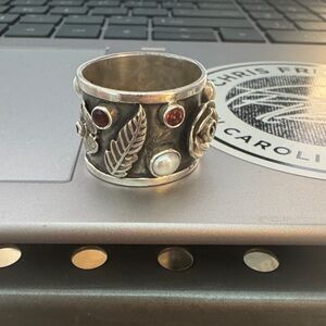 Sterling silver cigar ring 8.5.  Dogwood, lead, rose, ruby and pearl accents.